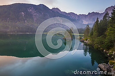 Spectacular, beautiful sunrise over Lake Laghi di Fusine Stock Photo