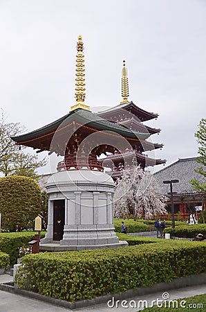 The spectacular Buddhist temple in Asakusa illuminated in the evening. Editorial Stock Photo