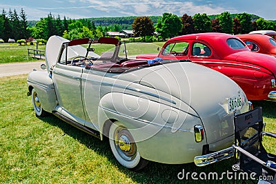 Spectacular car show in the Country Heritage Park, amazing rear side view of classic vintage cars Editorial Stock Photo