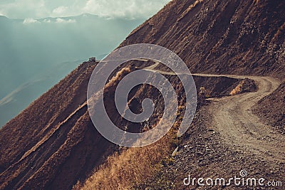 Spectacular and dangerous mountain road, Tusheti, Georgia. Adventure concept. Mount landscape. Unpaved winding road. Dirt serpenti Stock Photo