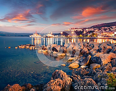 Spectacular evening view of Pilos town. Picturesque summer sunset on Ionian Sea Stock Photo