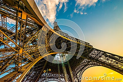 Spectacular unique colourful wide angle shot of the Eiffel tower from below, showing all pillars. Stock Photo