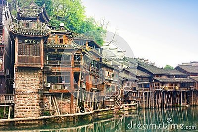 The Diaojiaolou traditional Chinese gabled wooden houses built on stilts be preserved in Fenghuang Stock Photo