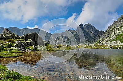 A spectacular landscape of a lake in Retezat Mountains, Romania Stock Photo