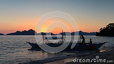 Spectacular sunset as viewed from Seven Commandos Beach in Philippines Stock Photo