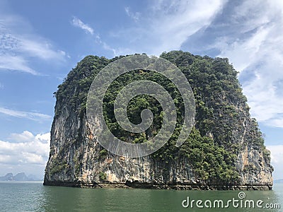 Spectacular, unique view from the sea to the hanging cliffs of Thailand Islands on a clear day Stock Photo