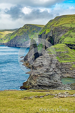 Spectacular coast of Faroe Islands, vertical composition Stock Photo