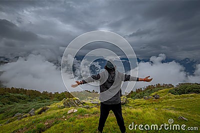 Young Solo traveler alone , has mountain, sky are background. image for travel, scenery, lonely, portrait, person, Landscape , Editorial Stock Photo