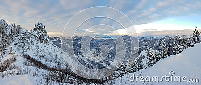 Spectacular winter mountain landscape illuminated by setting sun. Stock Photo