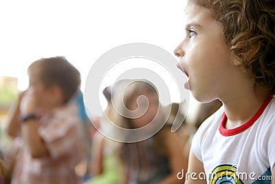 Spectator children looking at the show Stock Photo