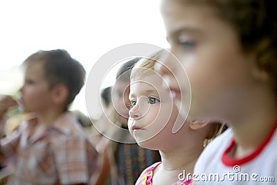 Spectator children looking at the show Stock Photo