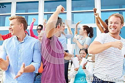 Spectators Cheering At Outdoor Sports Event Stock Photo