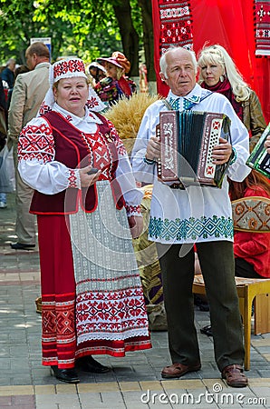 Speech of amateur ensemble in national Belarusian costumes Editorial Image