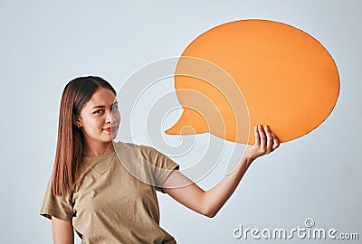 Speech bubble, smile and portrait of woman in studio isolated on a white background. Social media, poster and happy girl Stock Photo
