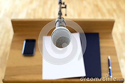 Speech podium and microphone in front of speaker Stock Photo