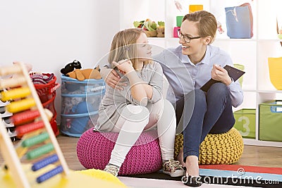 Speech therapist working with child Stock Photo