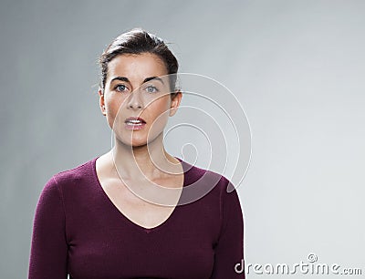 Speechless 30s girl expressing misunderstanding Stock Photo