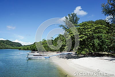 Speed boat at the beach ready for passenger entrance Editorial Stock Photo