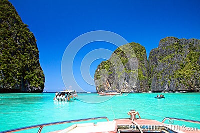 Speed boats and long tail boats Stock Photo