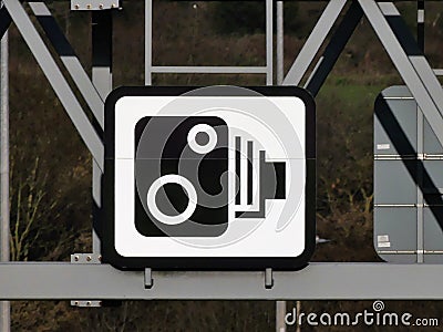 Speed camera sign on gantry above the M25 Motorway in Hertfordshire Stock Photo