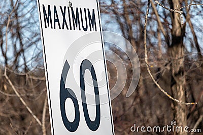 Speed limit sign says maximum 60 Stock Photo