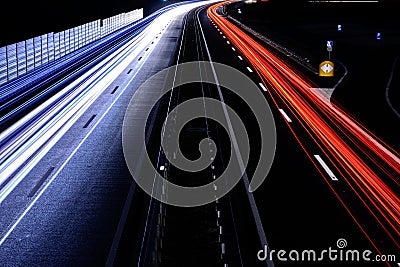 Speed Traffic - light trails on motorway highway at night, long Stock Photo