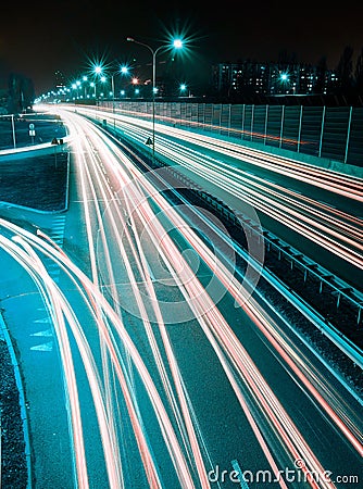 Speed Traffic - long time exposure on highway with car light trails at night Stock Photo