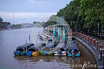 Speedboat on the `Martapura` river Editorial Stock Photo