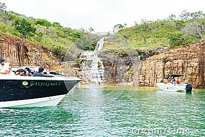 Speedboats and tourists at the Blue Lagoon Waterfall Editorial Stock Photo