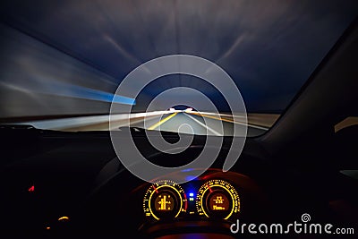 Speeding car dashboard Stock Photo