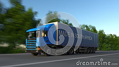 Speeding freight semi truck with MADE IN SOUTH AFRICA caption on the trailer. Road cargo transportation. 3D rendering Stock Photo