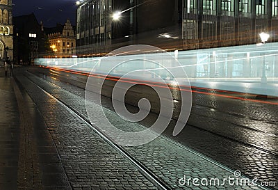 Speeding night tram Stock Photo