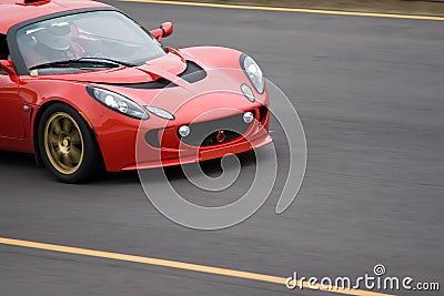 Speeding Sports Car Stock Photo