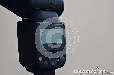 Speedlight gun with trigger set mounted on tripod Stock Photo