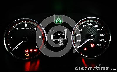 Speedometer and RPM gauge cluster of a Pickup Truck in 2 High Mode Stock Photo