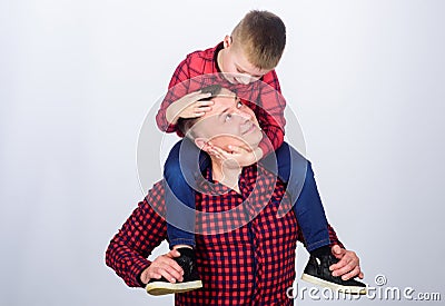 Spending carefree time. father and son in red checkered shirt. little boy with dad man. fathers day. happy family Stock Photo