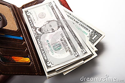 Spending money in your wallet Stock Photo