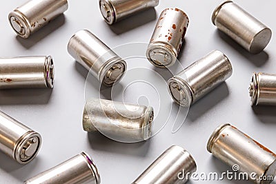 Spent used rechargeable Nickel Metal Hydride Ni-MH battery, grey background, flat lay Stock Photo