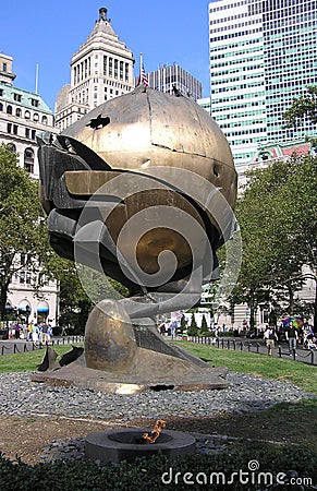 The Sphere and the Eternal Flame in memory of the tragedy of September 11, 2001. Battery Park, New York. Editorial Stock Photo