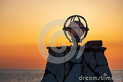 Spherical lamp illuminator on a sunset background Stock Photo