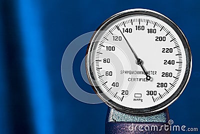 Sphygmomanometer closeup, blood pressure measurment medical equipment. Tonometer, medical tool on blue background, close Stock Photo