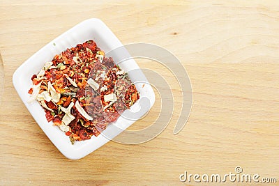Spice mixture for soup in dish on wood Stock Photo