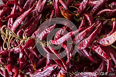Spice pattern asia spicy seasoning red pod chili dark claret background culinary base many fruits Stock Photo