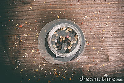 Spices. black peppercorns on wooden table Stock Photo