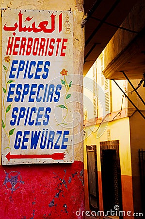 Spices Sign on Tanger Medina Wall, Foreign Languages Translation Stock Photo