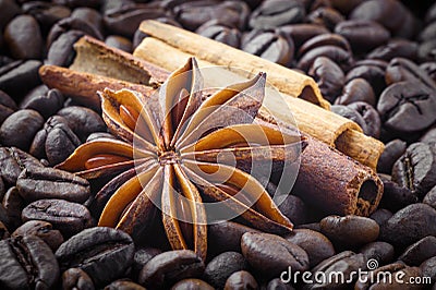 Spices; star anise, cinnamon on the background of coffee beans Stock Photo