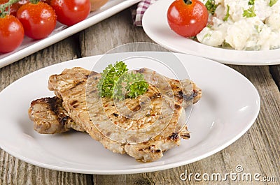 Spicey pork chop with parsley Stock Photo