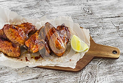 Spicy baked chicken wings Stock Photo