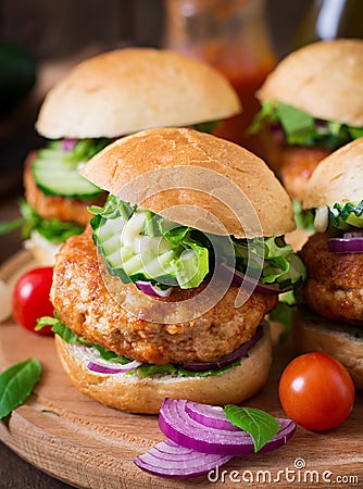 Spicy chicken burgers with tomato and eggplant - sandwich. Stock Photo