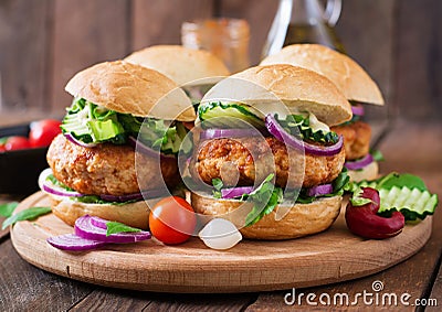 Spicy chicken burgers with tomato and eggplant - sandwich. Stock Photo